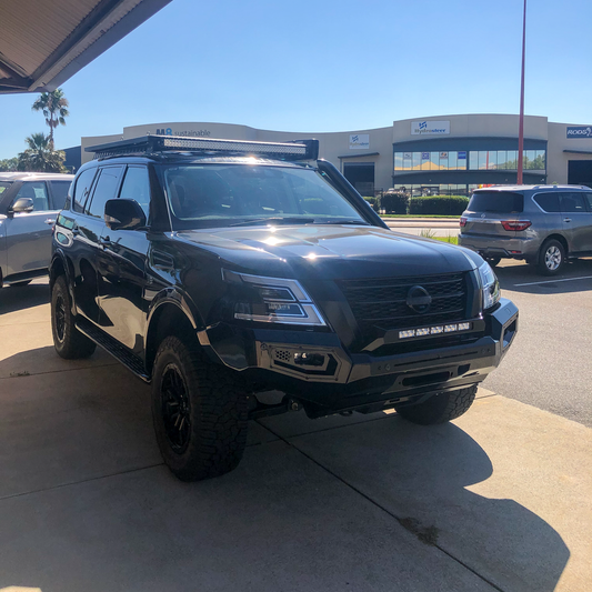 Y62 Nissan Patrol with AMV Automotive Slimline Flares colour matched to black