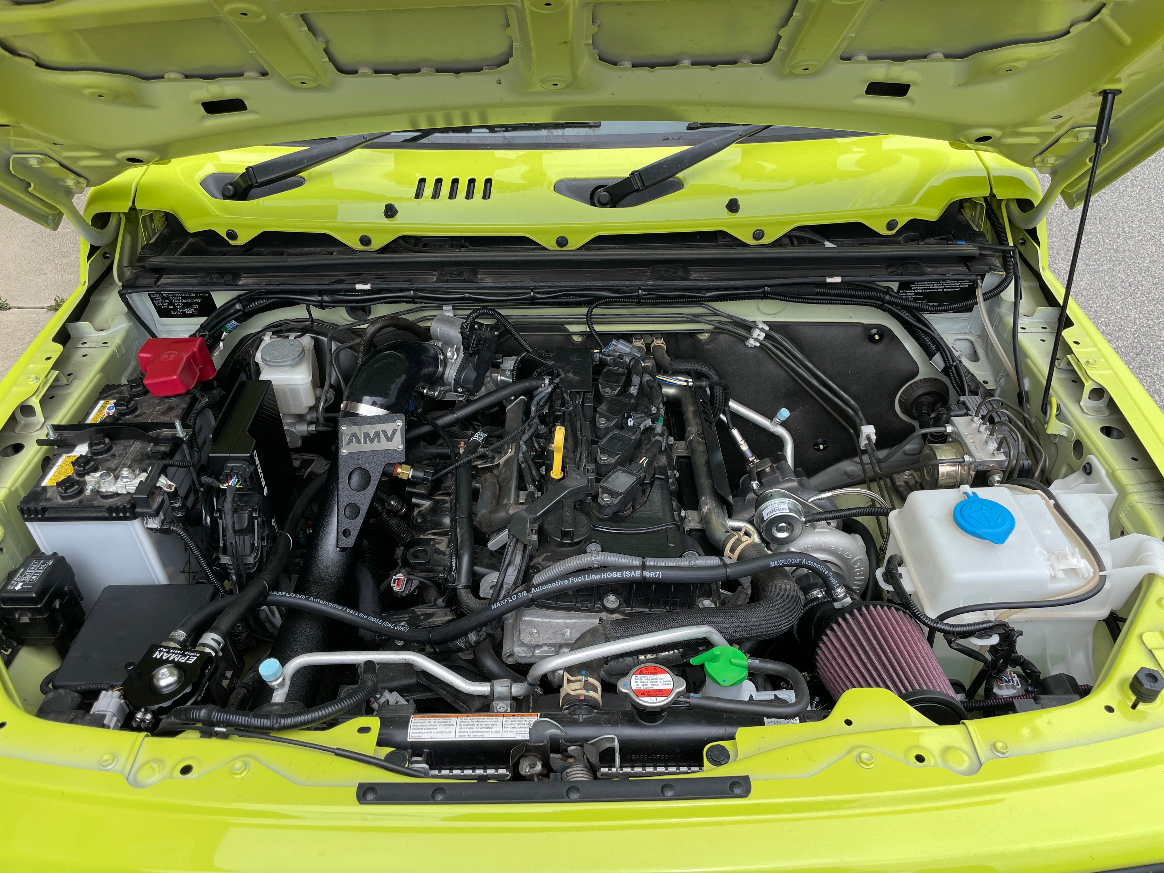Suzuki Jimny JB74 engine bay with an AMV Garret Motion Turbo kit fitted