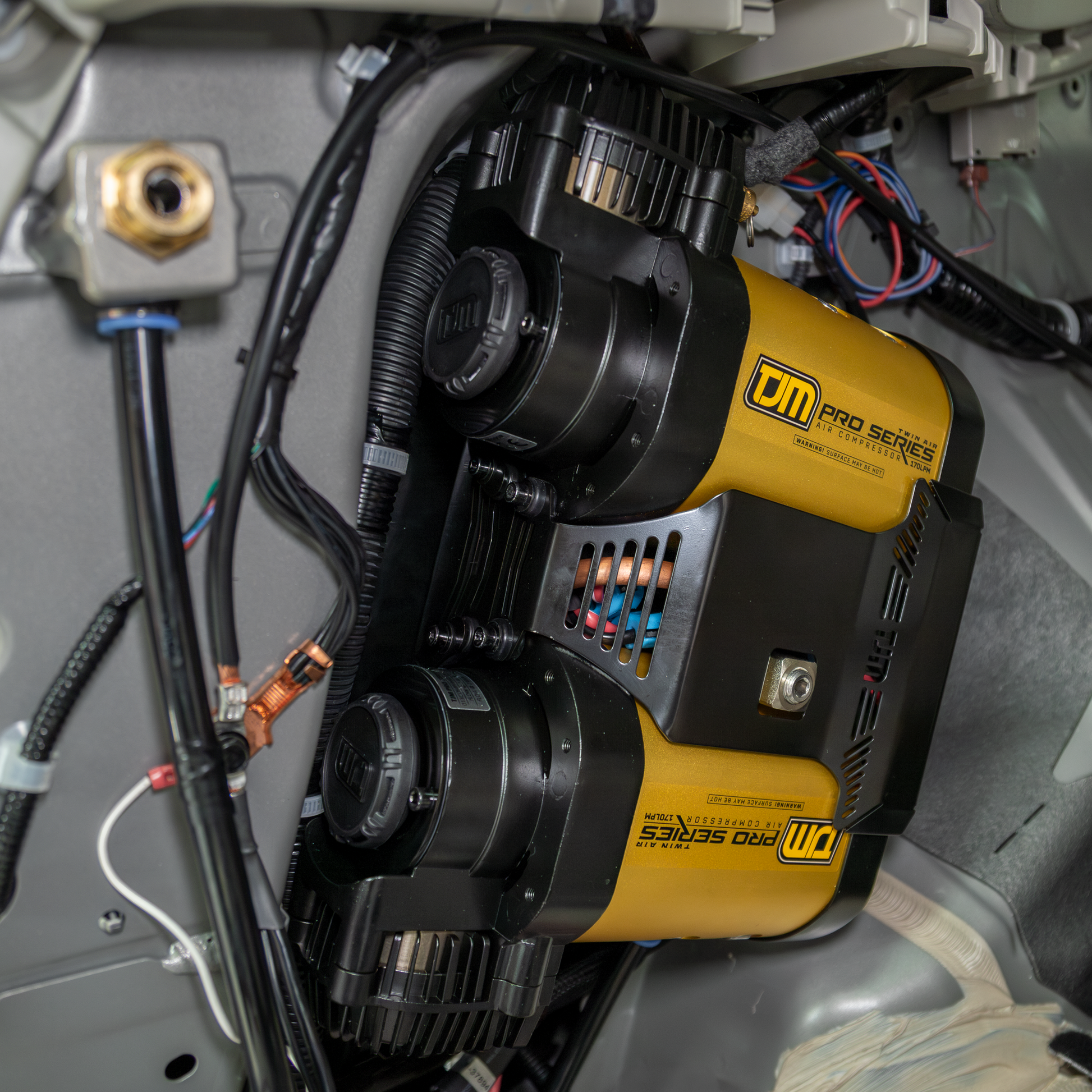 TJM Pro Series air compressor mounted on AMV Automotive Y62 Nissan Patrol bracket