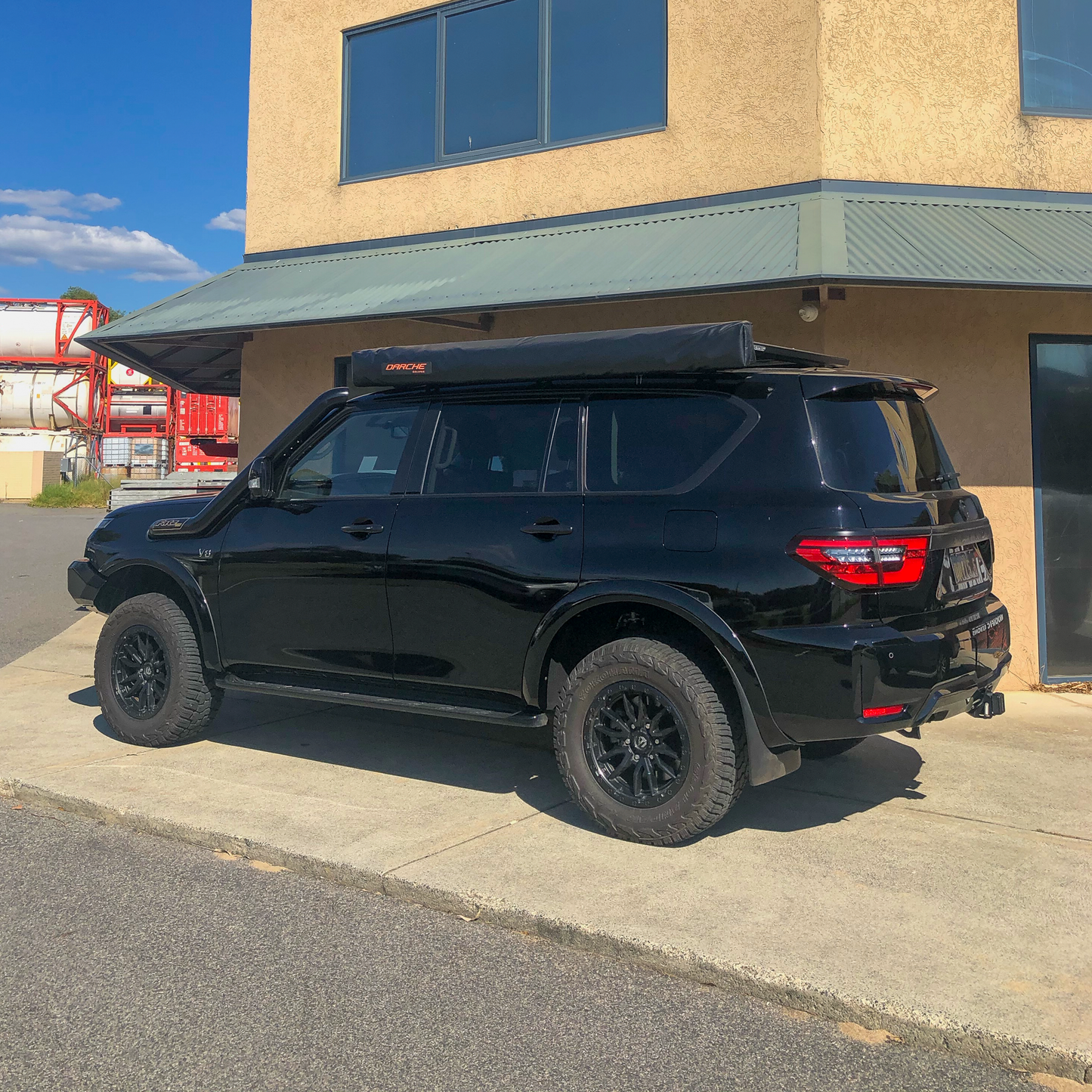 Y62 Nissan Patrol with AMV Automotive Slimline Flares colour matched to black