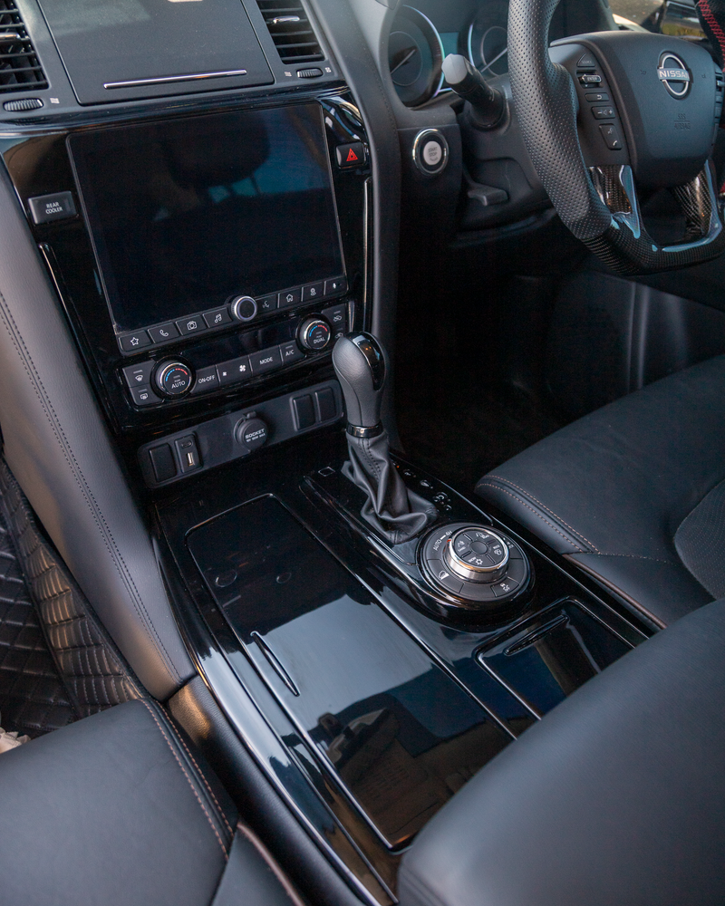 Interior view of Y62 Nissan Patrol with piano black interior. 