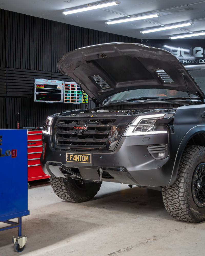 Black Nissan Patrol Y62 on Dyno getting AMV Automotive Stage 1 tune