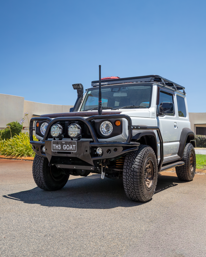 JB74 Suzuki Jimny fitted with Raslarr Rear bar, Revolution Rock Sliders, Azza Bullbar, Manta Performance Exhaust, Tough Dog Suspension, Harrop Performance TVS900 Supercharger, Redarc Tow Pro